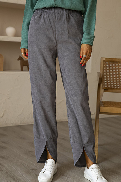 Pantalones casuales de color liso con abertura y bolsillos rectos