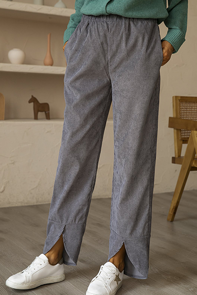 Pantalones casuales de color liso con abertura y bolsillos rectos