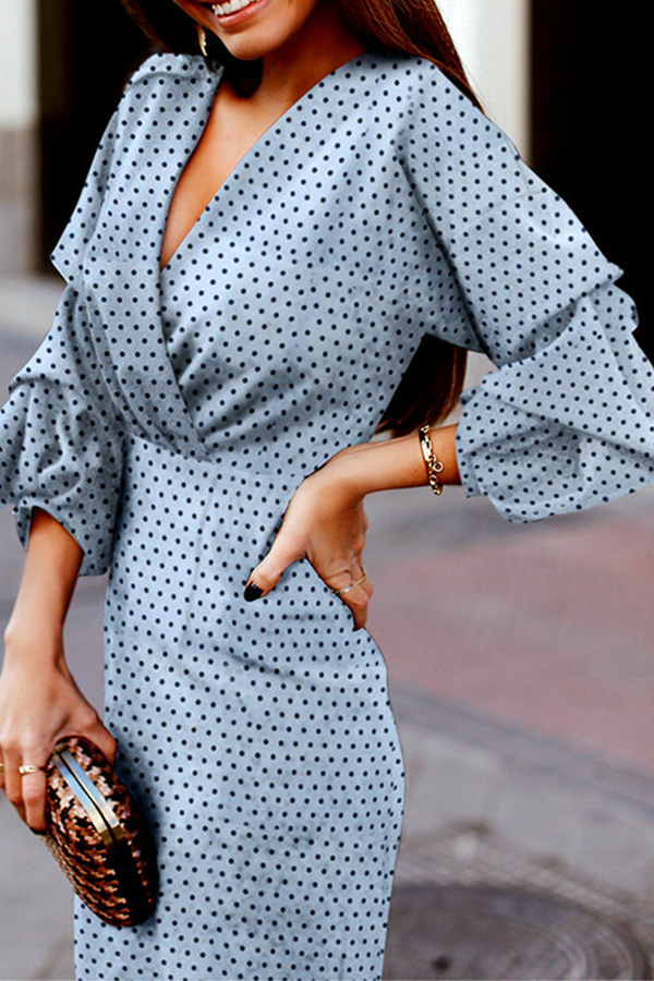 Vestidos elegantes de moda con falda y escote en V y lunares