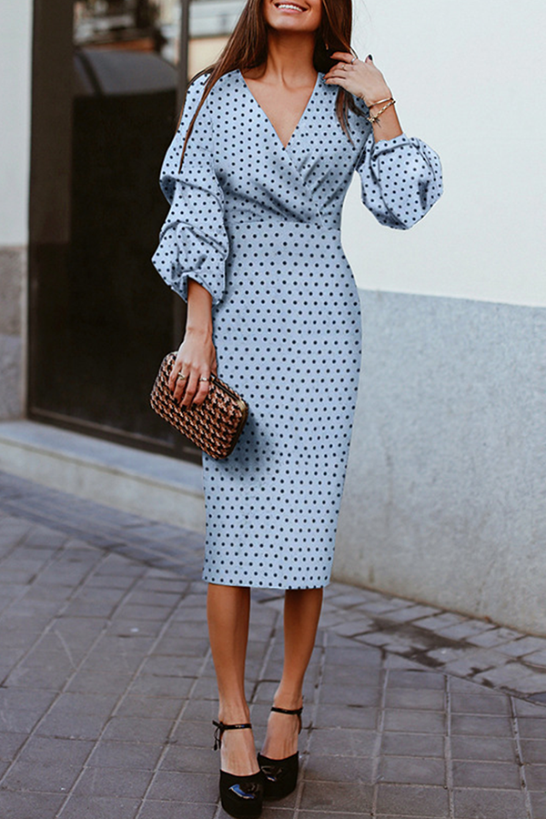 Vestidos elegantes de moda con falda y escote en V y lunares