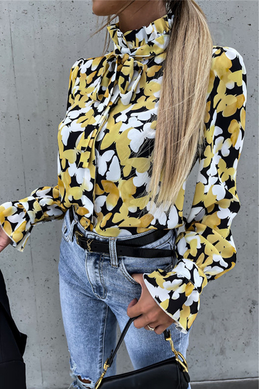Blusa elegante de moda con cuello de orillo y volantes con estampado