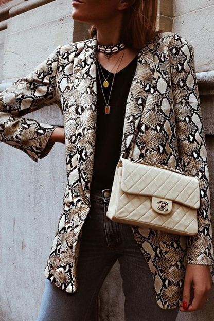 Prendas de abrigo con cuello vuelto y estampado de patchwork de moda