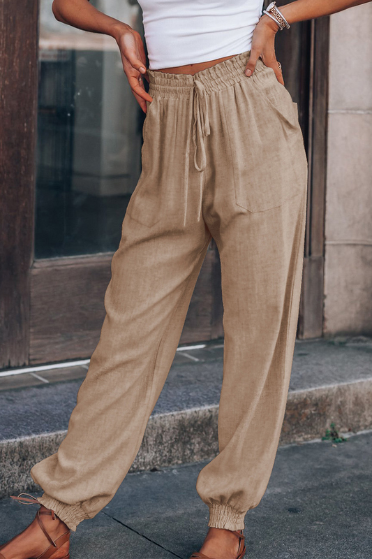 Pantalones casuales de color liso con abertura en la cintura y cintura media de harén
