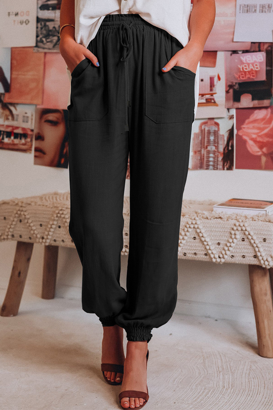 Pantalones casuales de color liso con abertura en la cintura y cintura media de harén