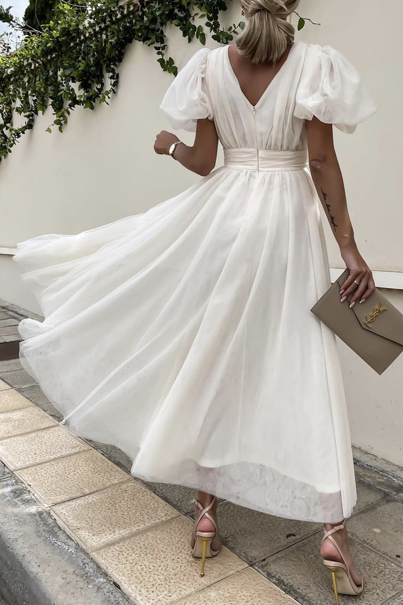 Vestidos de malla con cuello en V sólido de moda
