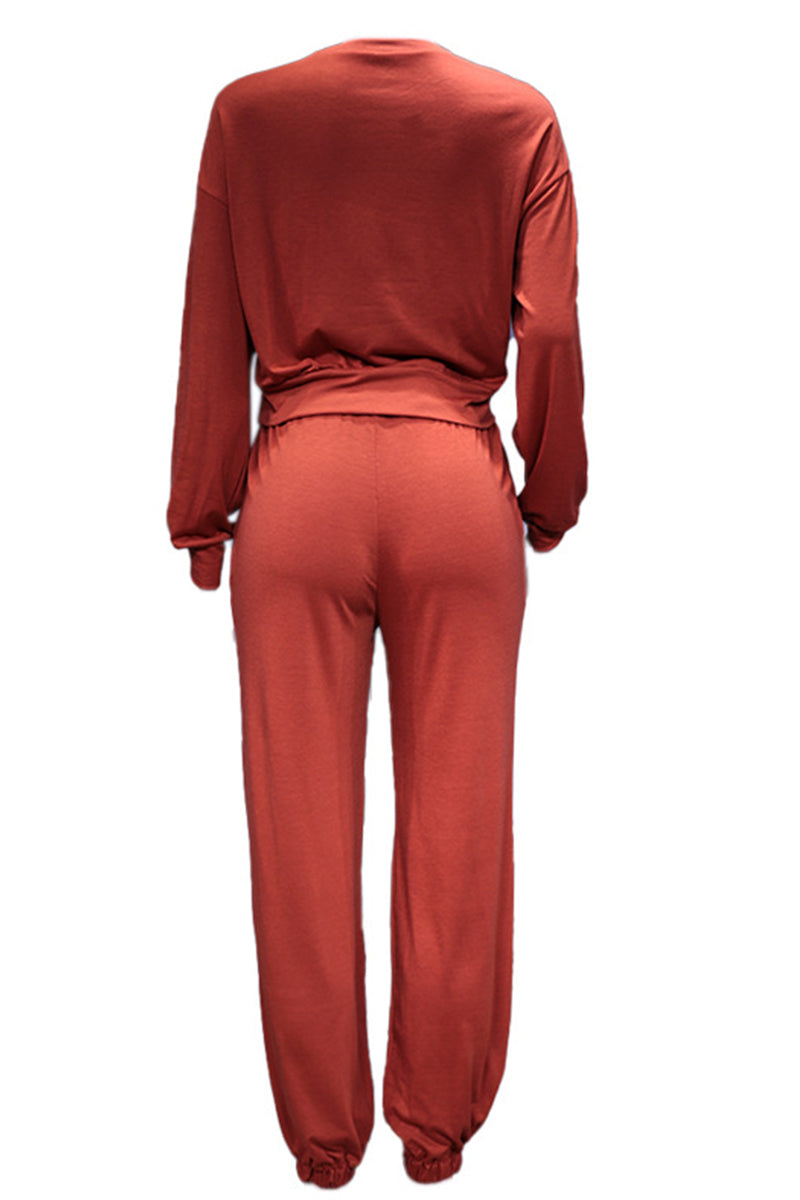 Conjunto informal de dos piezas con cuello redondo, manga larga y color liso