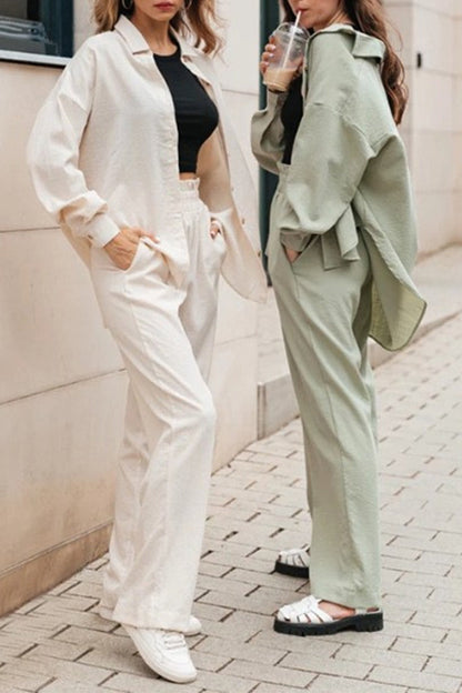 Elegante conjunto de dos piezas de manga larga con cuello vuelto y color liso