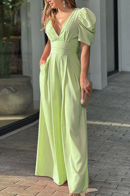 Mono elegante de color sólido con escote en V y espalda descubierta