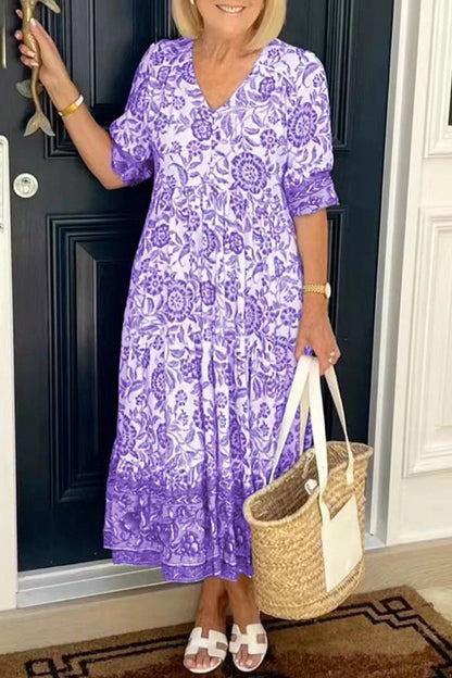 Elegante vestido de vacaciones con cuello en V, estampado tie-dye y patchwork.