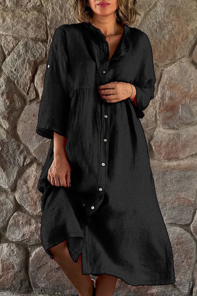 Vestido camisero informal sencillo con botones lisos y cuello mandarín.