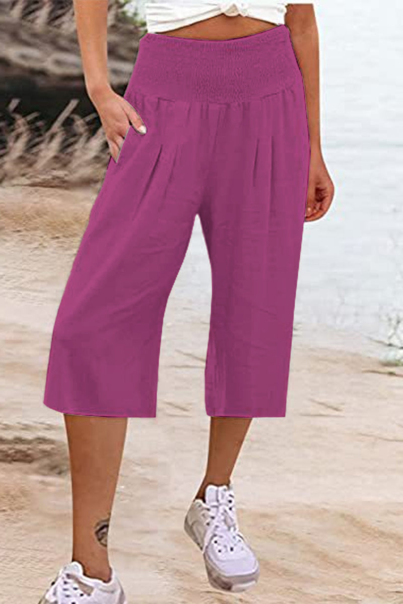 Pantalones casuales sencillos de color liso con bolsillos, sueltos, de cintura alta y pierna ancha.
