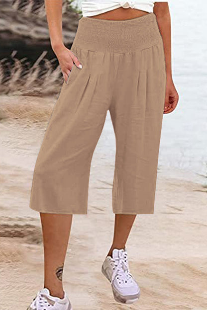 Pantalones casuales sencillos de color liso con bolsillos, sueltos, de cintura alta y pierna ancha.
