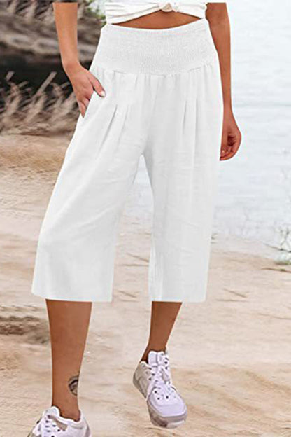 Pantalones casuales sencillos de color liso con bolsillos, sueltos, de cintura alta y pierna ancha.