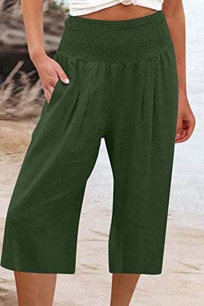 Pantalones casuales sencillos de color liso con bolsillos, sueltos, de cintura alta y pierna ancha.