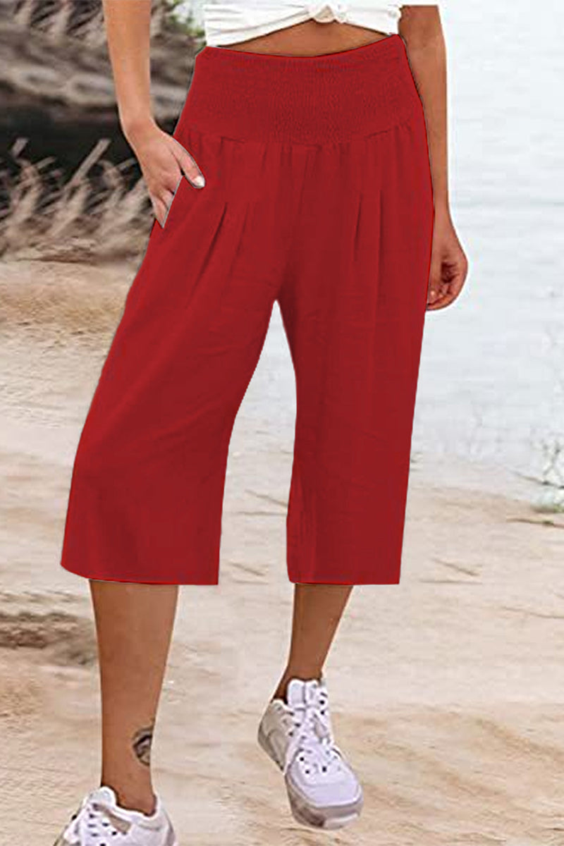 Pantalones casuales sencillos de color liso con bolsillos, sueltos, de cintura alta y pierna ancha.