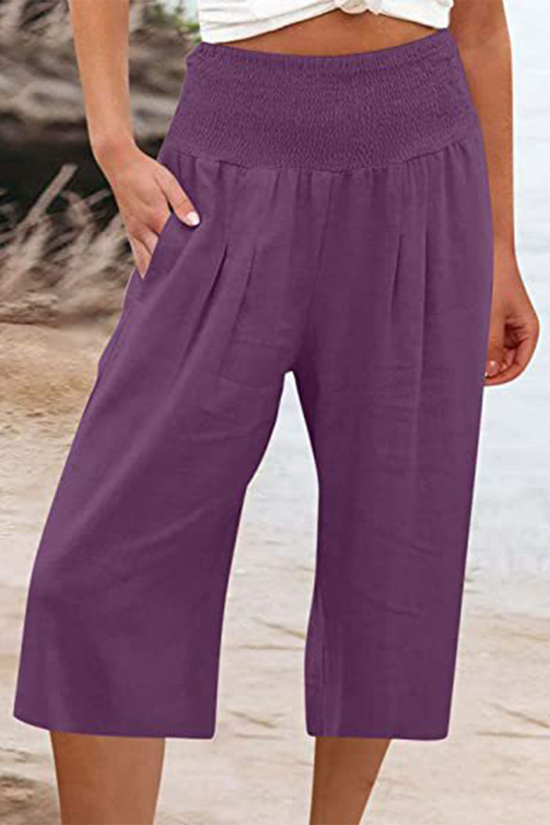 Pantalones casuales sencillos de color liso con bolsillos, sueltos, de cintura alta y pierna ancha.