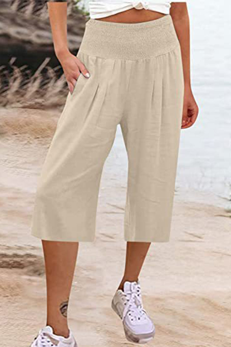 Pantalones casuales sencillos de color liso con bolsillos, sueltos, de cintura alta y pierna ancha.