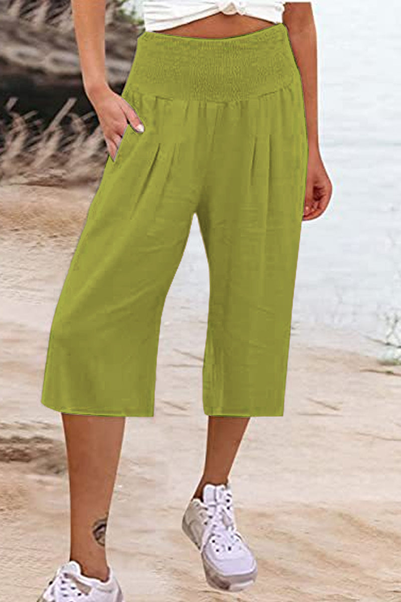 Pantalones casuales sencillos de color liso con bolsillos, sueltos, de cintura alta y pierna ancha.