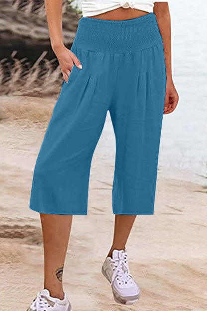 Pantalones casuales sencillos de color liso con bolsillos, sueltos, de cintura alta y pierna ancha.