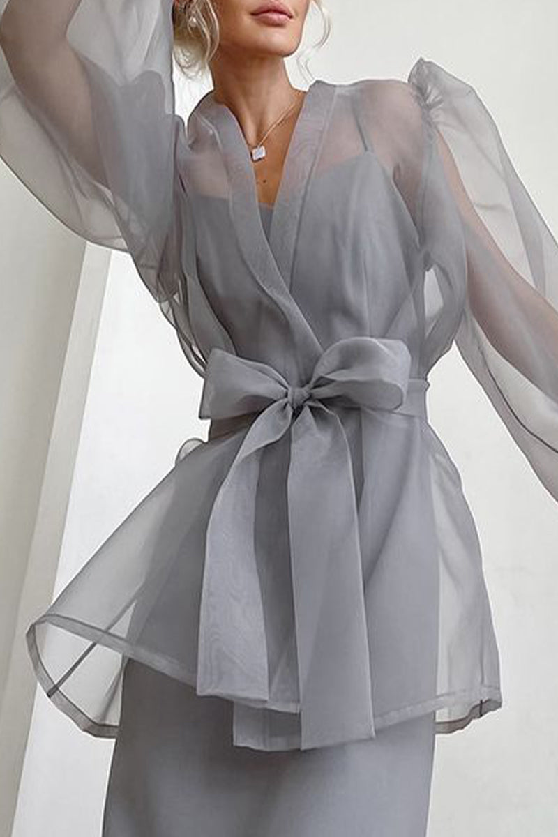 Elegantes blusas de escote en V transparente con frenillo liso