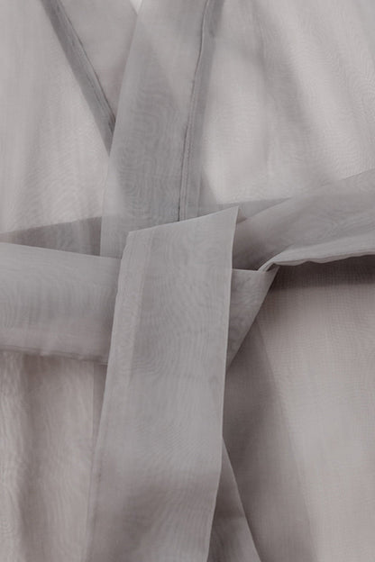 Elegantes blusas de escote en V transparente con frenillo liso