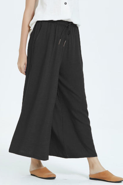 Pantalones casuales sencillos de color liso con cintura alta, pierna ancha y holgados.