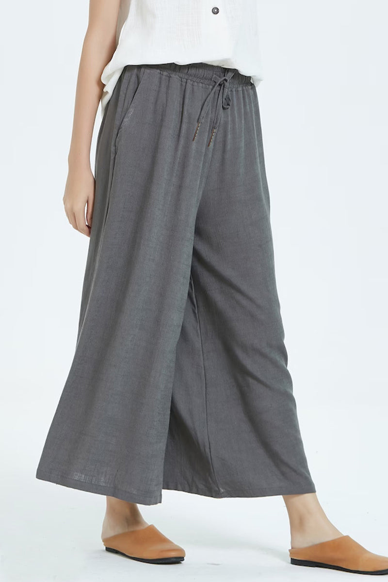 Pantalones casuales sencillos de color liso con cintura alta, pierna ancha y holgados.