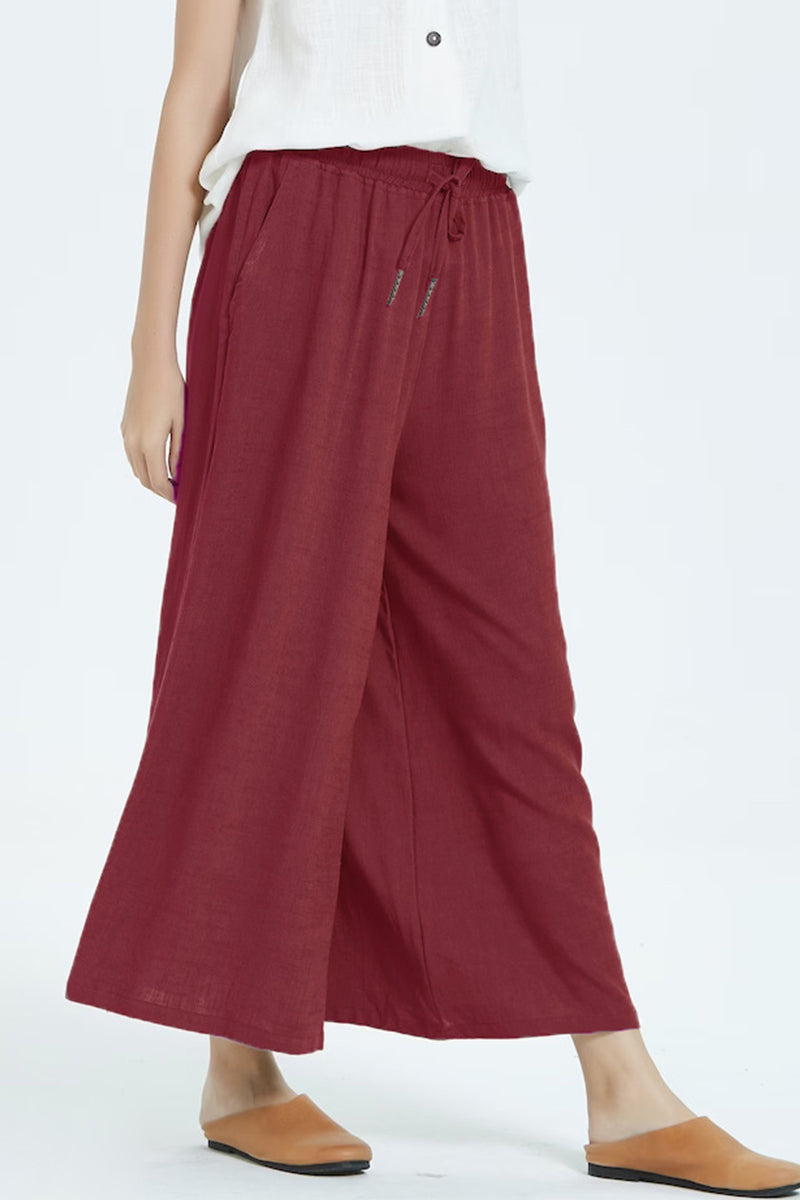 Pantalones casuales sencillos de color liso con cintura alta, pierna ancha y holgados.