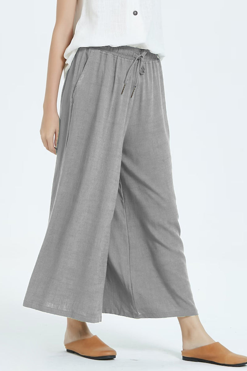 Pantalones casuales sencillos de color liso con cintura alta, pierna ancha y holgados.