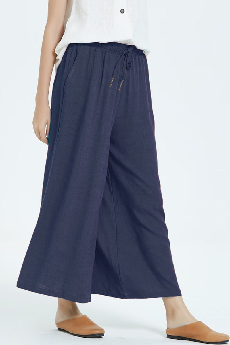 Pantalones casuales sencillos de color liso con cintura alta, pierna ancha y holgados.