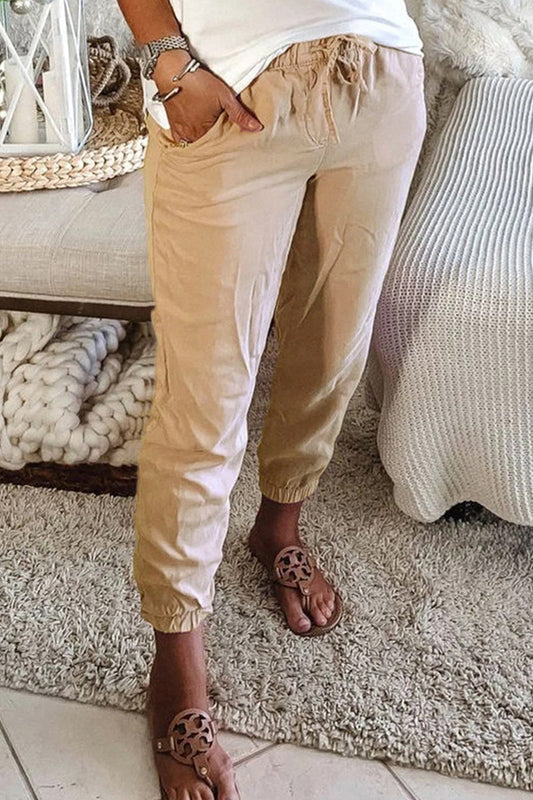 Pantalones casuales de color liso con bolsillos y cintura media regular