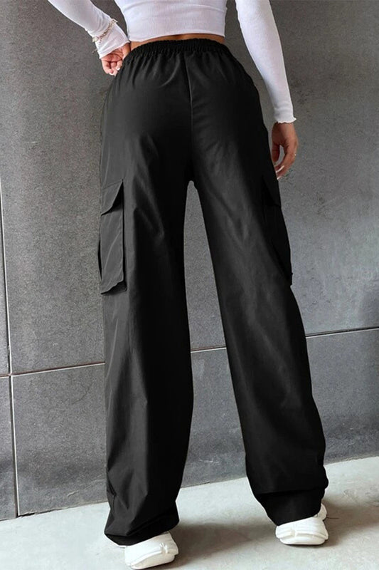 Pantalones rectos de cintura media, holgados, con bolsillos sólidos, de color liso