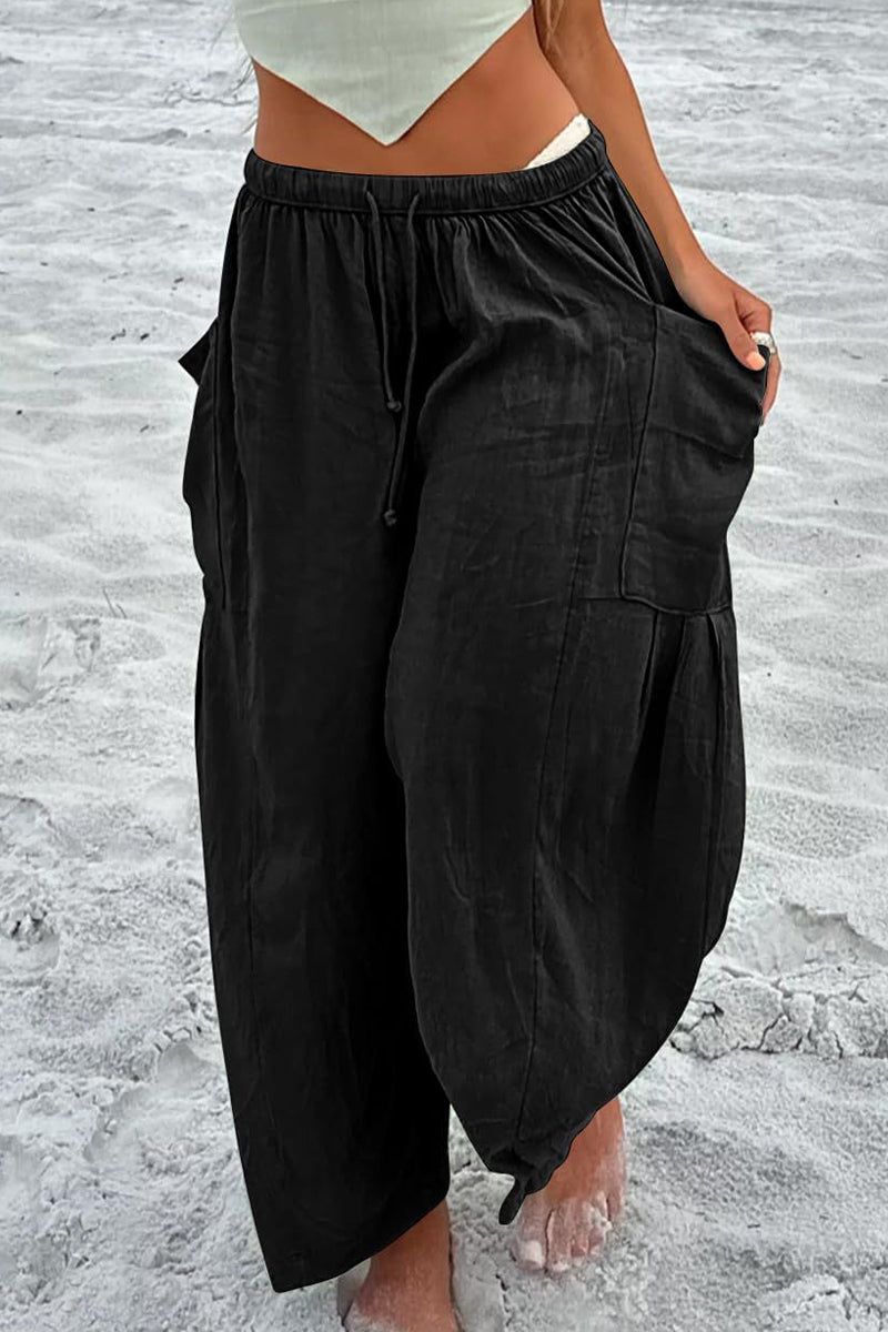 Pantalones casuales sencillos de color liso con bolsillos, holgados, de cintura media y pierna ancha.