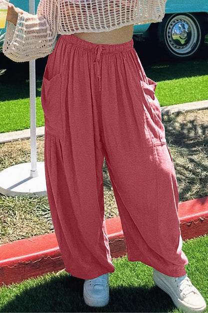Pantalones casuales sencillos de color liso con bolsillos, holgados, de cintura media y pierna ancha.