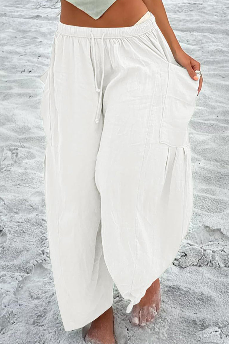 Pantalones casuales sencillos de color liso con bolsillos, holgados, de cintura media y pierna ancha.