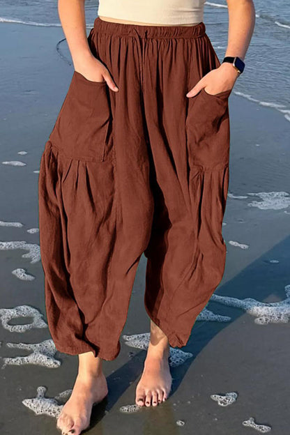 Pantalones casuales sencillos de color liso con bolsillos, holgados, de cintura media y pierna ancha.