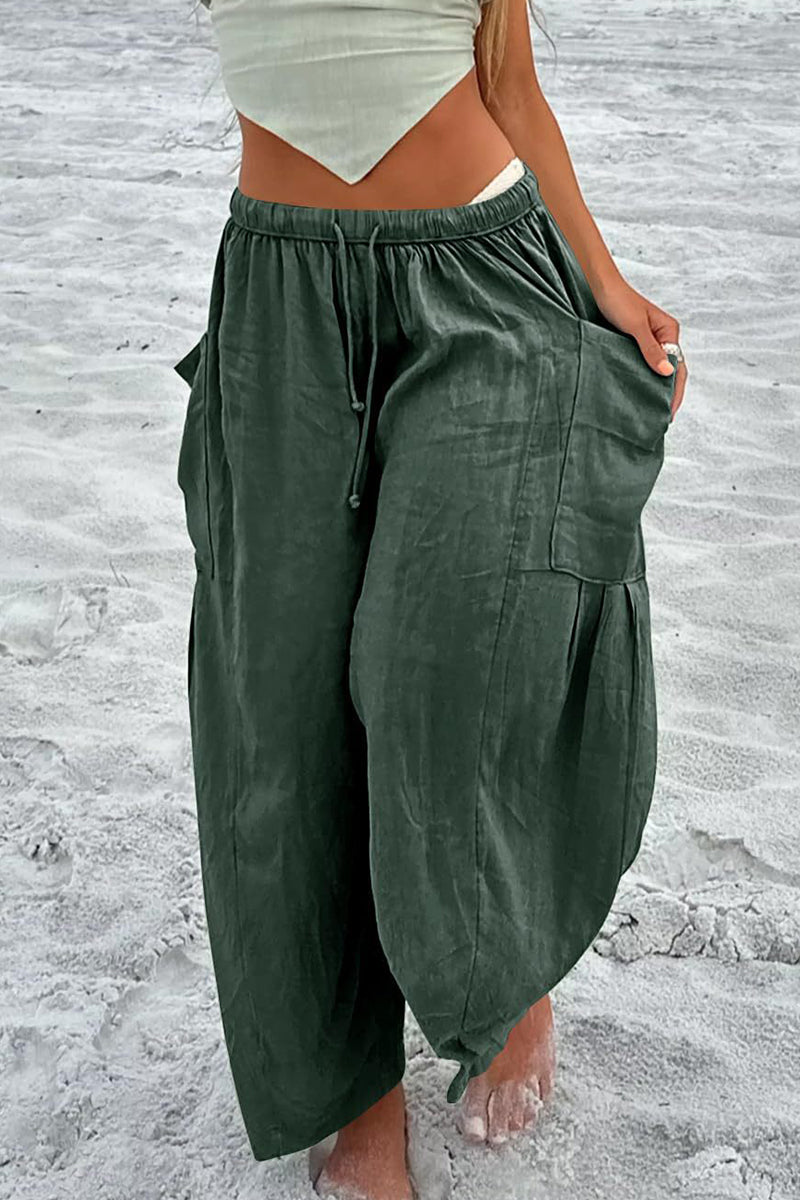 Pantalones casuales sencillos de color liso con bolsillos, holgados, de cintura media y pierna ancha.