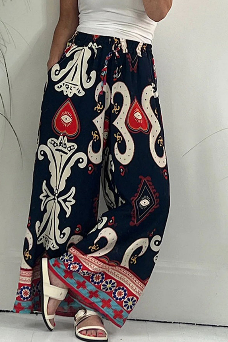 Pantalones casuales con estampado, bolsillo, holgados, pierna ancha y estampado completo