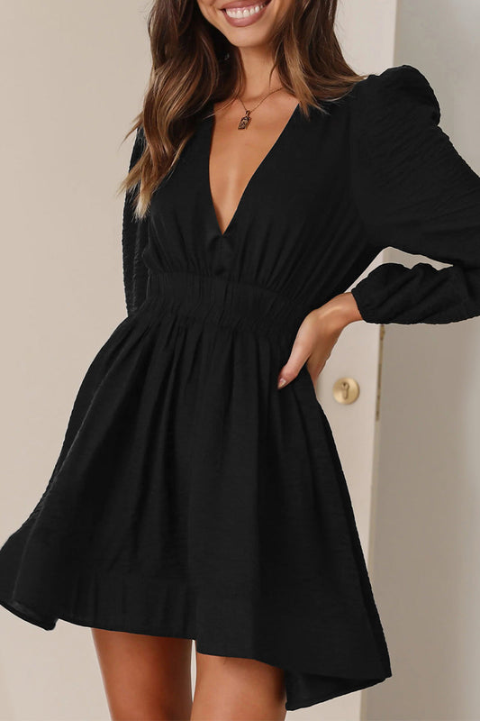 Vestidos casuales plisados con cuello en V y pliegues sólidos
