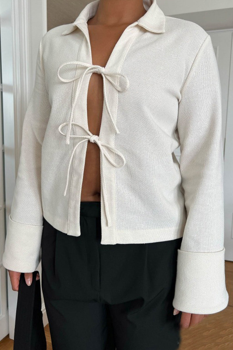 Prendas de abrigo con cuello camisero, sexys y sencillas, de color liso y con frenillo.