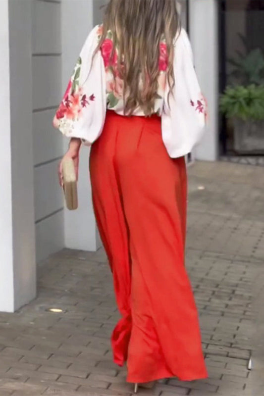 Elegante conjunto de dos piezas con cuello en V, manga larga y bolsillo floral