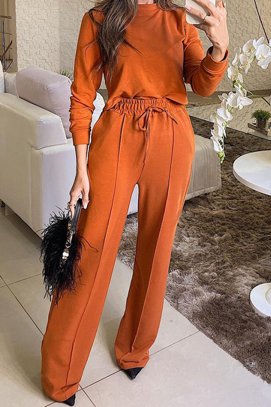 Elegante conjunto de dos piezas de manga larga con cuello redondo y frenillo liso