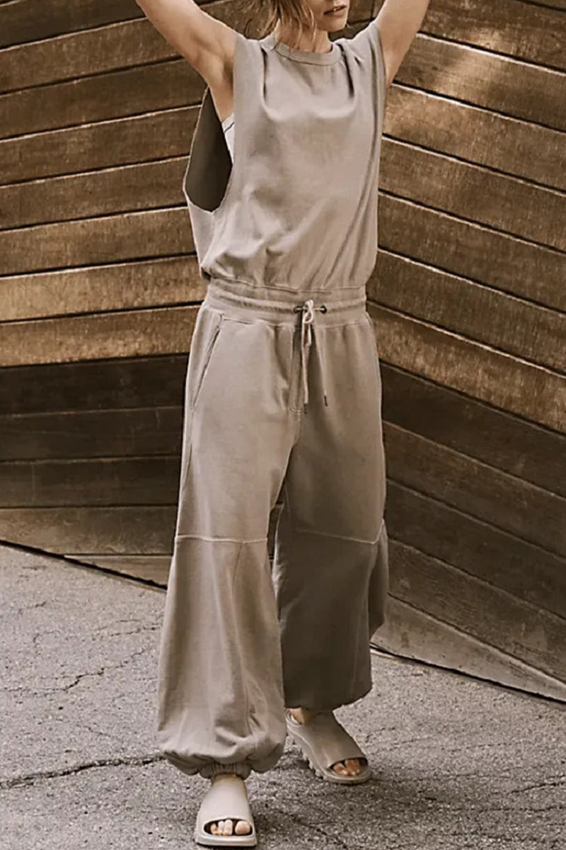Mono holgado informal sencillo con bolsillos sólidos, frenillo, espalda descubierta y cuello redondo