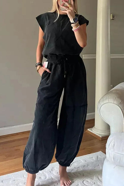 Mono holgado informal sencillo con bolsillos sólidos, frenillo, espalda descubierta y cuello redondo