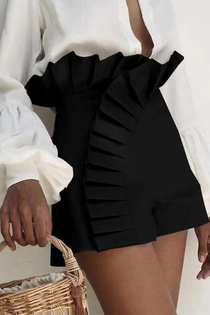 Elegante simplicidad, pantalones de talle alto con volantes y parches sólidos