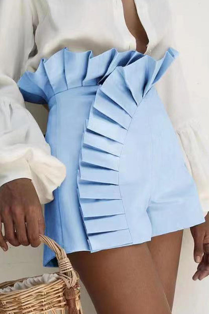 Elegante simplicidad, pantalones de talle alto con volantes y parches sólidos