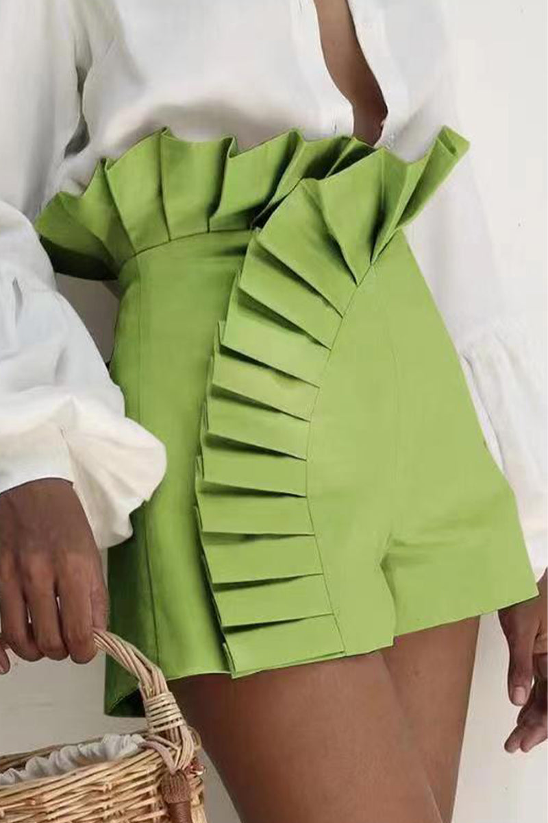 Elegante simplicidad, pantalones de talle alto con volantes y parches sólidos