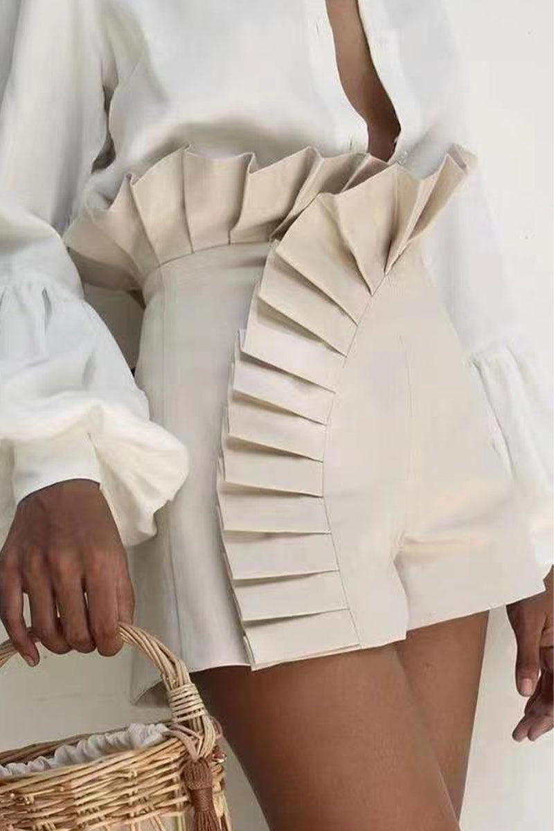 Elegante simplicidad, pantalones de talle alto con volantes y parches sólidos