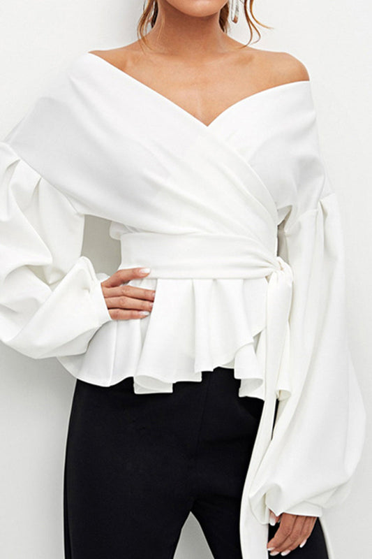Elegante blusa lisa con escote en V y lazo