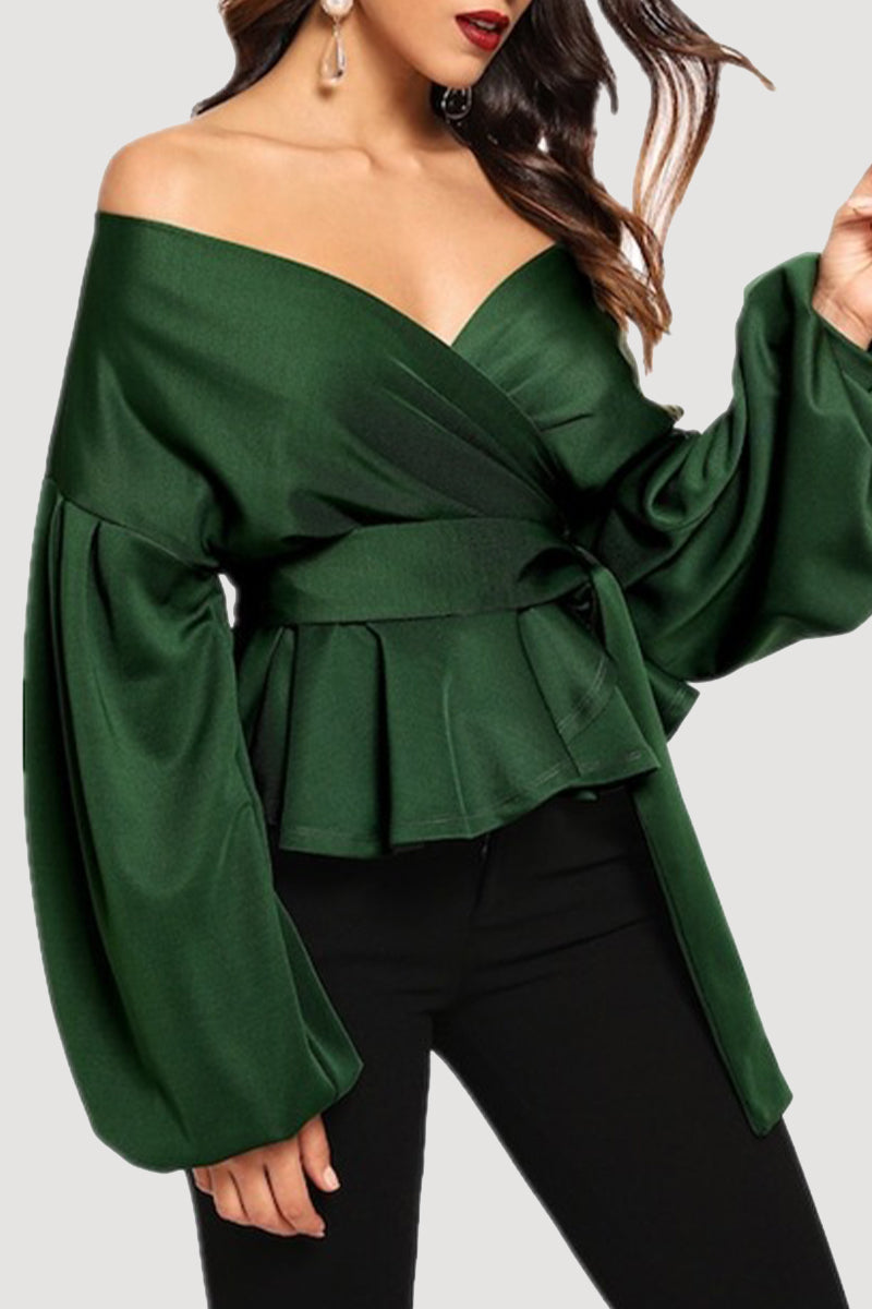 Elegante blusa lisa con escote en V y lazo